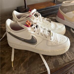 Nike White and Gray Sneakers with Gold Accents
